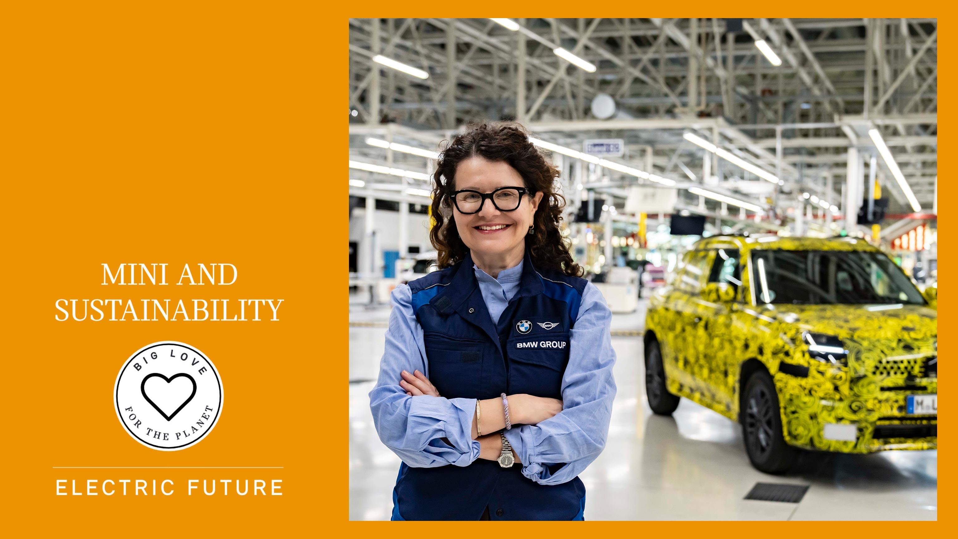 Image of Stefanie Wurst, head of MINI, standing next to the new MINI Countryman in the BMW Group factory hall in Leipzig.